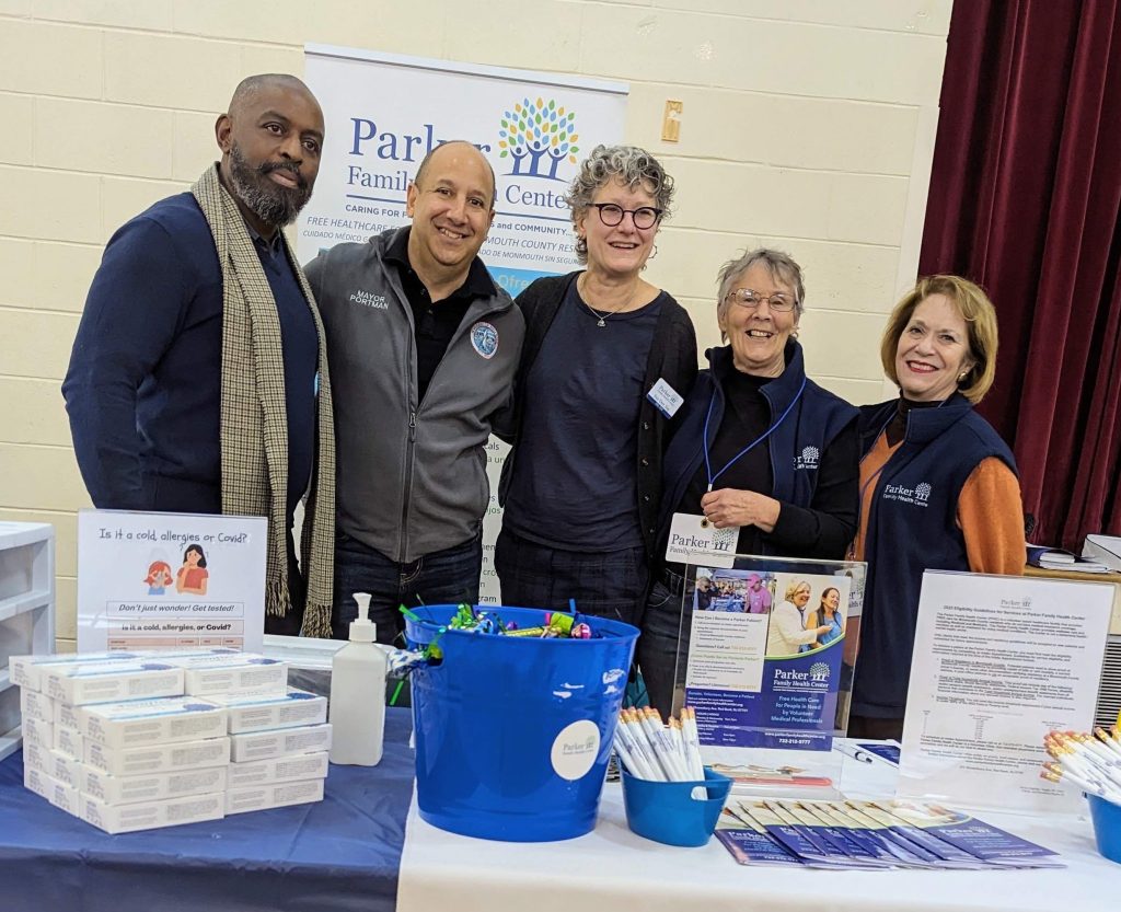 Parker staff and volunteers at a community outreach table