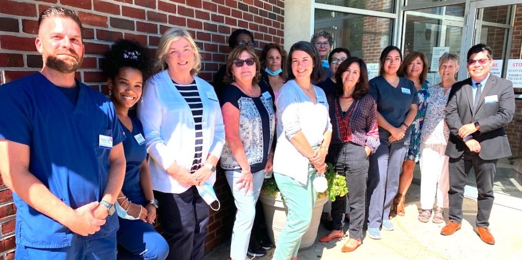 Parker staff and volunteers gathered outside the clinic